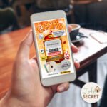 Carte à gratter virtuelle Casino affichée sur un smartphone tenu dans la main
