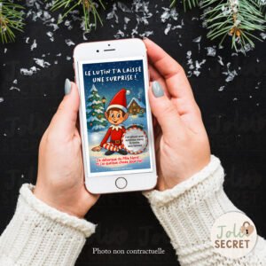 Gros plan sur le message secret du Lutin de Noël révélé sur l'écran.