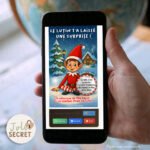 Geste de la main grattant l'écran pour la Carte numérique Lutin de Noël.